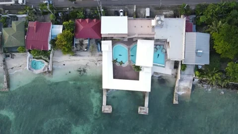 Drone is going down - Hotel at the beach - swimming pool Stock Footage 301603669