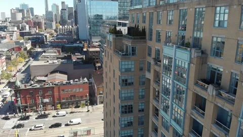 Drone going up in downtown Toronto Stock Footage 143196101