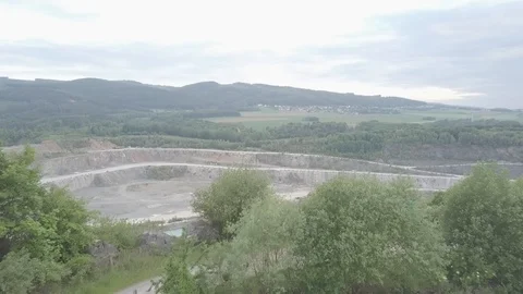 Drone Going Up Revealing Huge Blue Sea Stone Pit Stock Footage 110715411