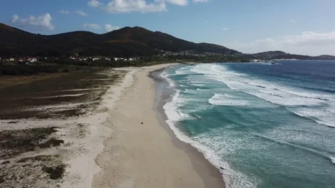 DRONE GOING INTO THE SEA BLUE WAVES Stock Footage 99830227