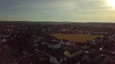 Drone Going Up Showing Fields And Houses Stock Footage 103480301