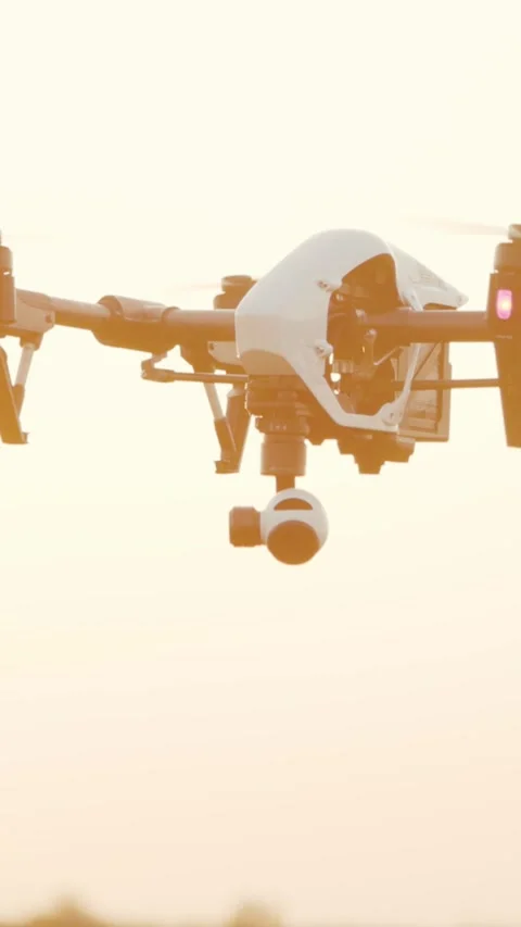 A drone gracefully captures vibrant fields and stunning sunsets Stock Footage 316511597