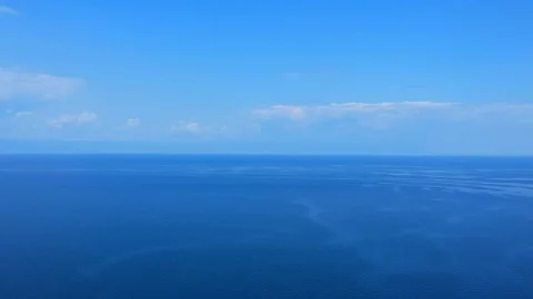The drone gradually flies over the surface of the water. Lake Baikal, nature of Video stock 128319677