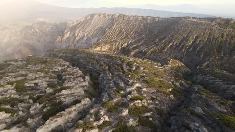 Drone Half Orbit Ijen Crater Edge Golden Hour East Java Indonesia Volcanic Stock Footage 334647427