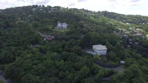 Drone heading towards building in the mountain Stock Footage 63451625