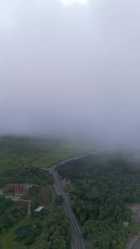 Drone at the height of clouds, cloudy day over the lake. Taken with a drone Stock Footage 278715311
