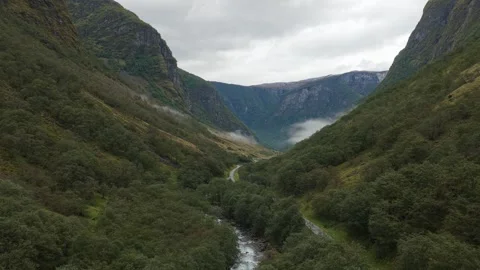 Drone high-angle: road to Undredal via green valley, Norway. Stock Footage 321002770