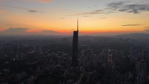 Drone highlights Merdeka 118 skyscraper during Kuala Lumpur sunset Stock Footage 332151266