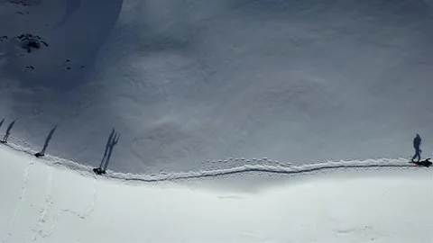 Drone of hikers in the middle of the mountains Video stock 323841882