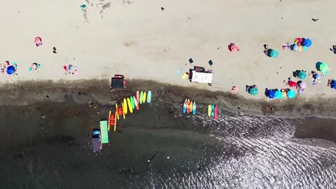 Drone Horizontal Tracking Top Down View over a Packed Sandy Beach with Kaya.. Video stock 339252252