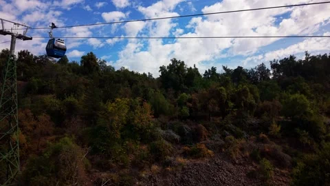 Drone Horizontal Tracking View of a Blue Cable Car Cabin Travelling Along t.. Vídeos de archivo 339254141