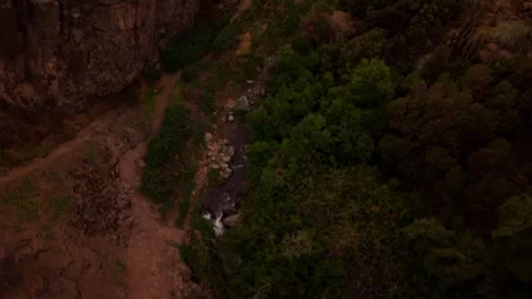 Drone Horizontal Zooming Out View from a Top Down River Bed to a Large Moun.. Stock Footage 339254160