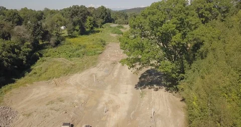 Drone of housing construction path outside rich development Stock Footage 95150309