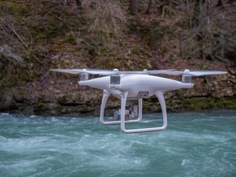 A drone hover in flight in front of the camera Stock Photos
