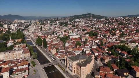 Drone Hover of Sarajevo City Hall Vijecnica and Miljacka River, 4K Stock Footage 337181058