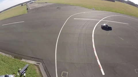 Drone hovering above racetrack 스톡 동영상 49586915