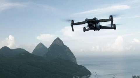 Drone hovering in the air with the Pitons of St. Lucia in the background. 스톡 동영상 308722525