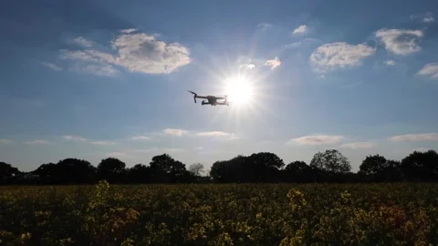 Drone Hovering in Front of Sun Stock Footage 143114094