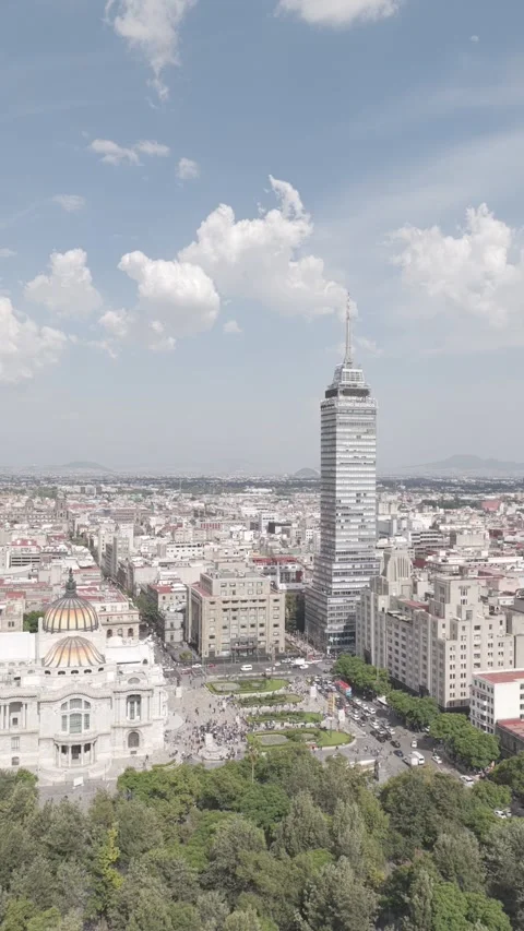 Drone hovering over Alameda Central with vertical panoramic views of Torre Stock Footage 342331260