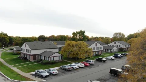 Drone hovering over apartment complex in Clinton Township MI Video stock 118737572