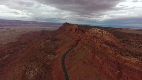 Drone hovering over desert highway and mountain Stockbeeldmateriaal 148599853
