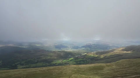 Drone hovering over the mountain peak with a panoramic overlook of the uplands. Stock Footage 253675079