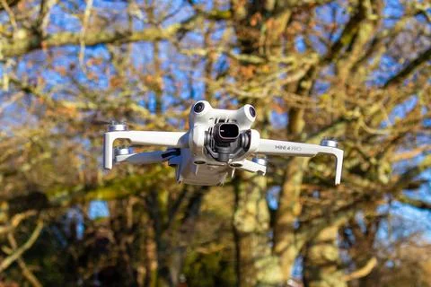 Drone hovering in the sky Stock Photos