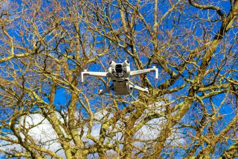 Drone hovering in the sky Stock Photos