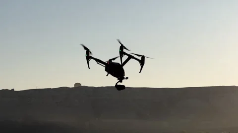 A drone hovers in the air Stock Footage 319091900