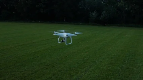 Drone Hovers In The Air At Sunset Stock Footage 92401173