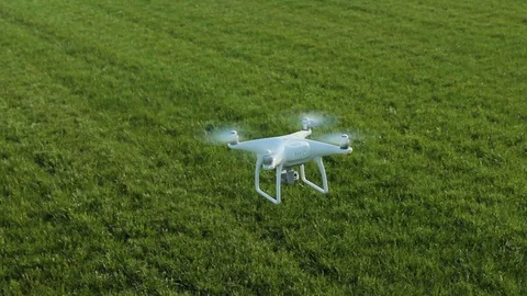 Drone Hovers Close To The Ground Stock-Footage 92401043