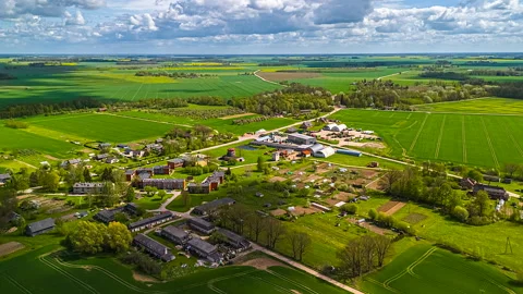 Drone hyper lapse over farmland fields in Europe Stock Footage 310340490