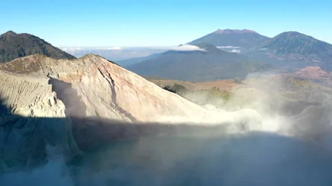 Drone hyper-lapse shot of active volcano in Indonesia Stock Footage