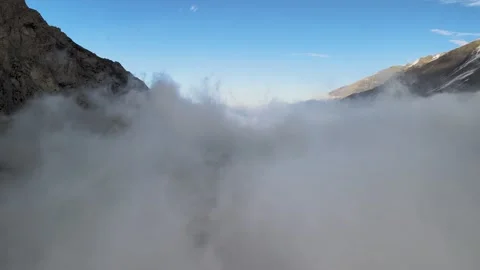 Drone Hyperlapse Above Fog in a Mountain Valley Stock-Footage 340324360