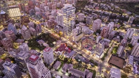 Drone hyperlapse advancing toward Hotel W in El Golf, Santiago, Chile Stock Footage 310519559