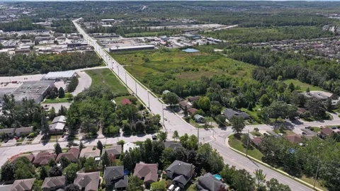 Drone Hyperlapse of Busy Intersection in Barrie, Ontario - Editorial use Stock Footage 316089616