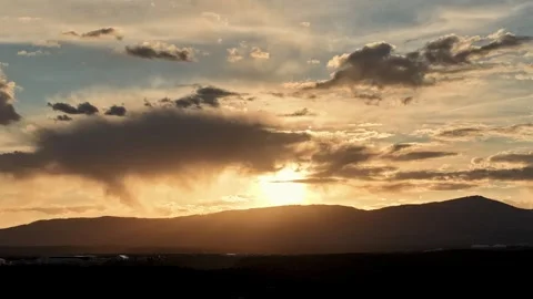 Drone Hyperlapse of Dynamic Moody Clouds Rolling across a Vibrant Southwest Stock Footage 334154882