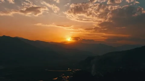 Drone Hyperlapse of Golden Sunset Over Pokhara Valley and Mountain Ridges Nepal Stock Footage 345557274