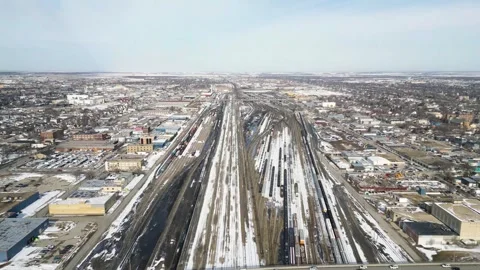 Drone hyperlapse over busy bridge and rail yard in Winnipeg Manitoba Stock Footage 333580291
