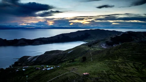 Drone hyperlapse over Isla del Sol on Lake Titicaca at sunset Stock Footage 332217886