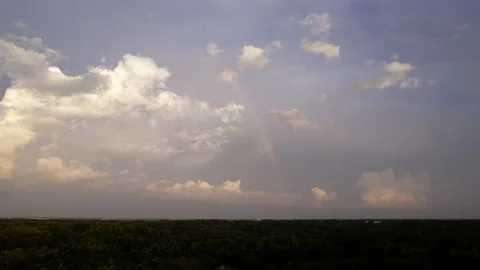 Drone Hyperlapse of Rainbow and Clouds in 10-bit ProRess 422HQ HLG Rec.2020 HDR Stock Footage 201960659