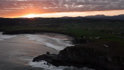 Drone Hyperlapse of the sun rising over the hills and beautiful beach in Spain Stock Footage 126549054