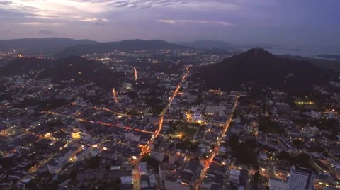 Drone Hyperlapse of Traffic and Streets in Phuket Town, Thailand, at Dusk Stock-Footage 66380253