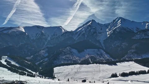 Drone hyperlapse of Ždiar ski resort and snowy forest in High Tatras winter Stock Footage 346313194