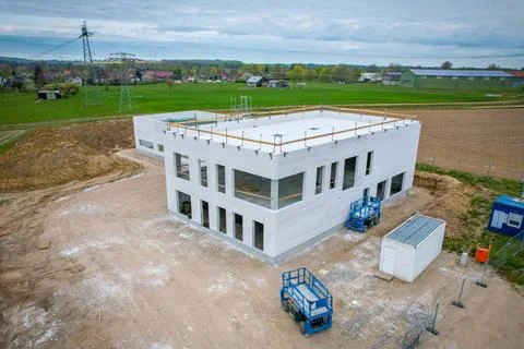 A drone image of a construction site on which a company building is being ... Fotos de archivo