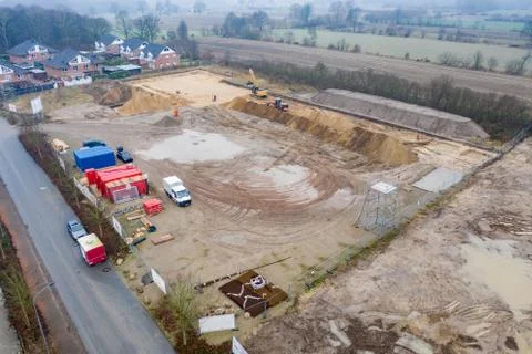 Drone image of a large construction site where the floor is being prepared fo Stock Photos