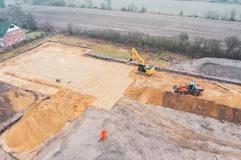 Drone image of a large construction site where the floor is being prepared fo Stock Photos