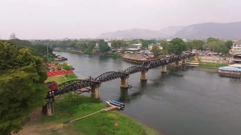 Drone image of railway bridge spanning River Kwai, Kanchanaburi Stock Footage 304659025