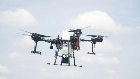 Drone for irrigation on the farm field Stock Footage 255620949