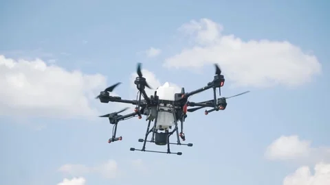 Drone for irrigation on the farm field Stock Footage 255620962